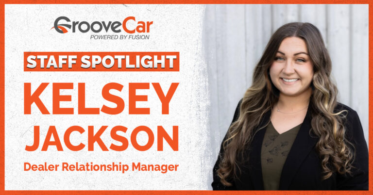 Kelsey Jackson smiling in professional attire for GrooveCar’s Staff Spotlight feature.